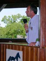 Clive Richardson on the speaker's rostrum in the Hall of Champions